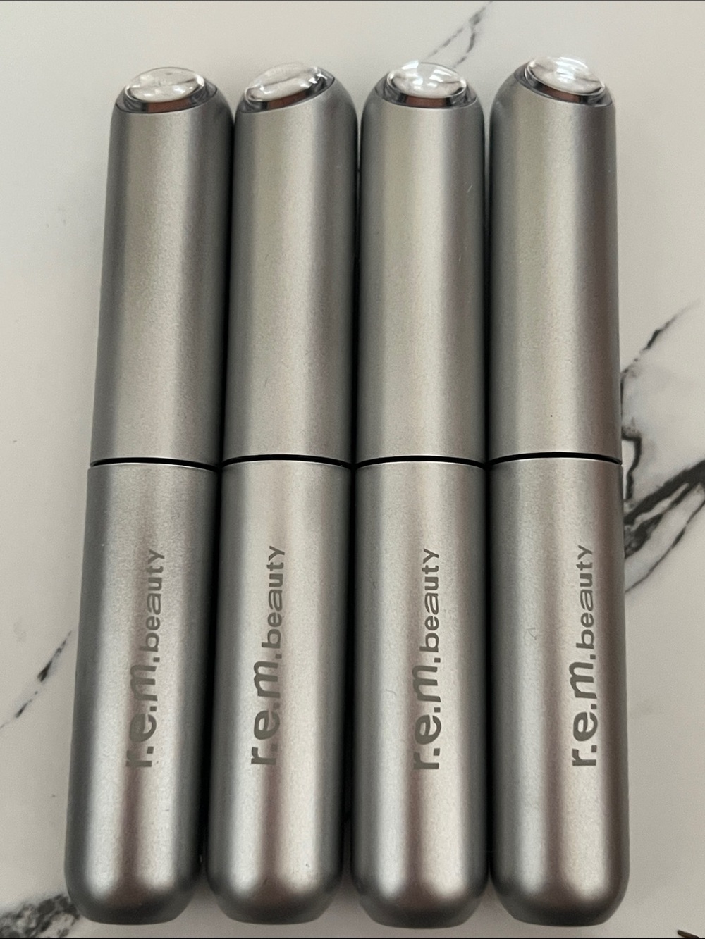 r.e.m. beauty Nude Lipstick — Sleek Silver Finish Closes with Magnet